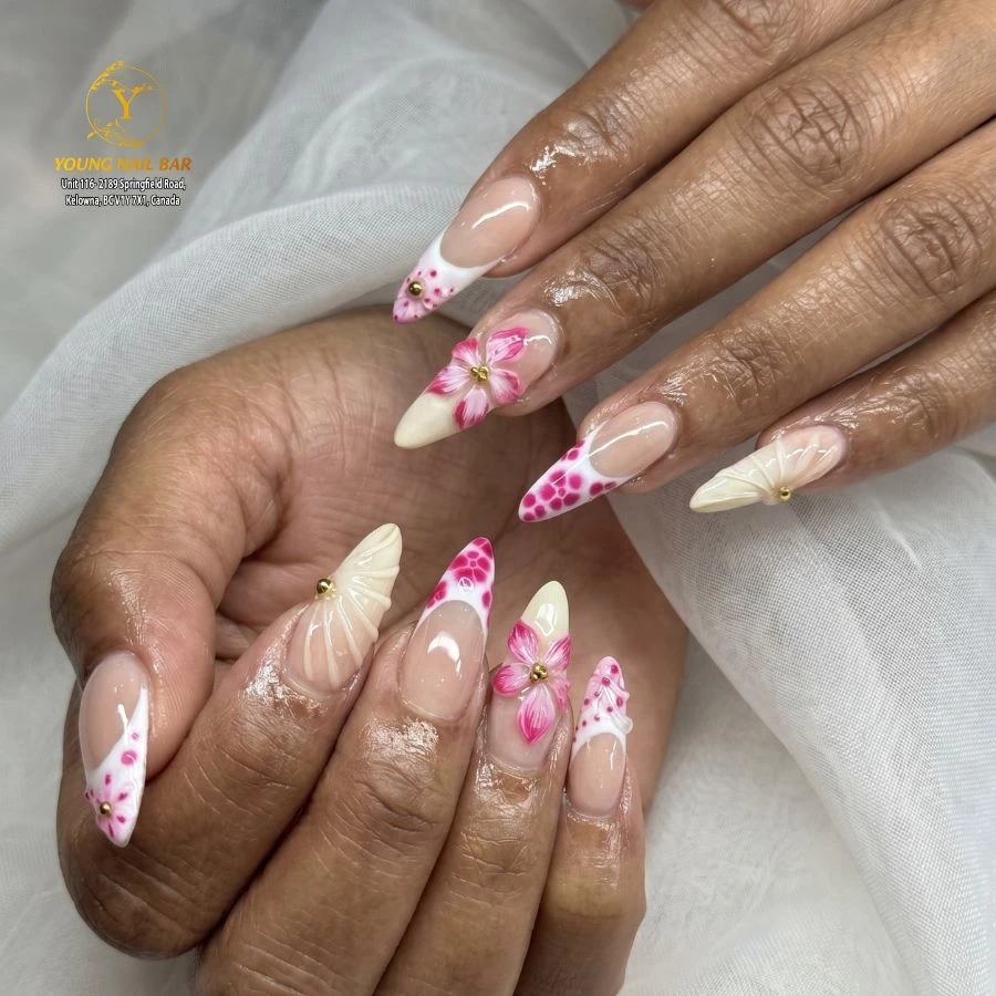 Floral pink and white nail art by Young Nail Bar