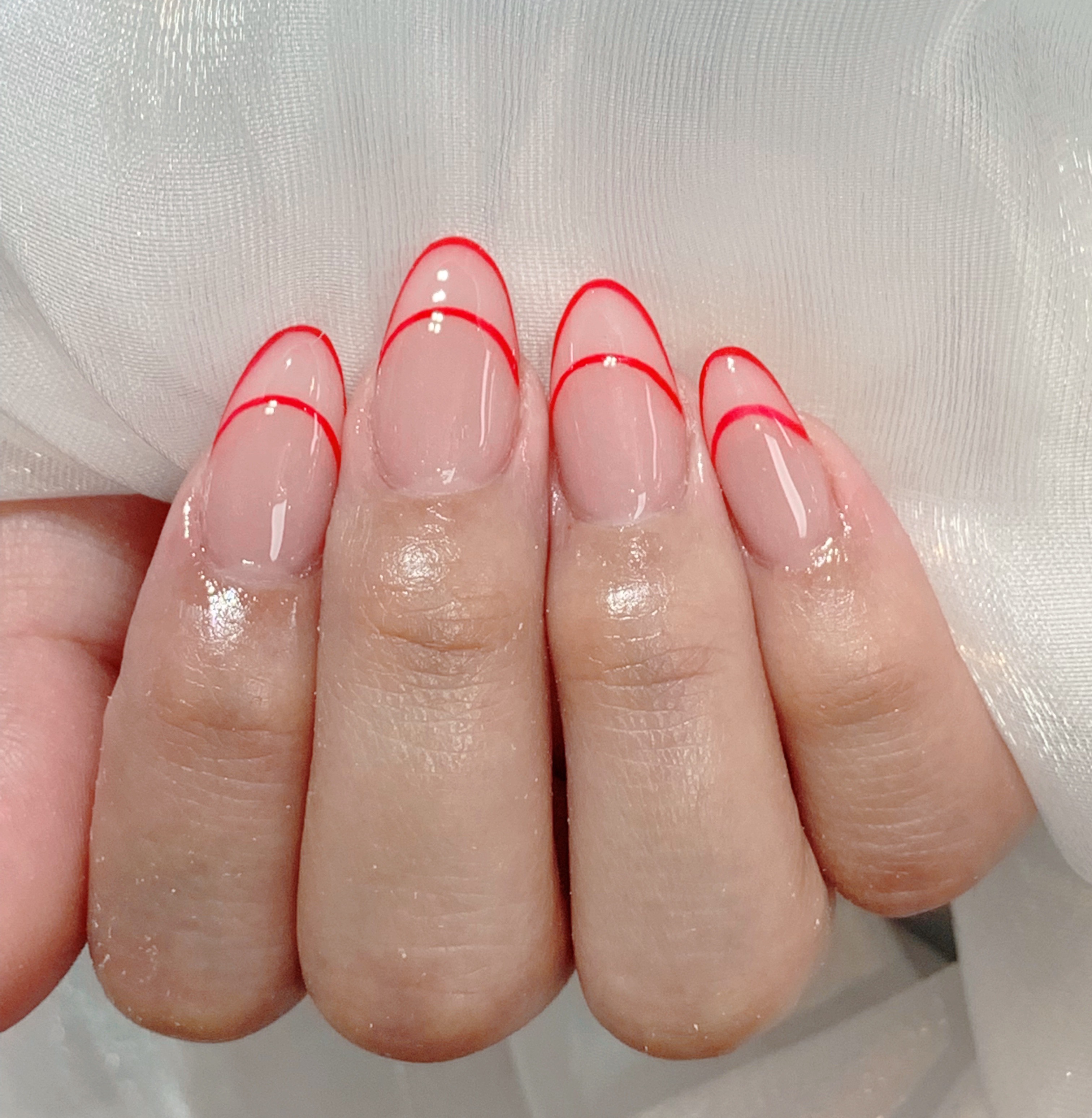 Minimal red French manicure by Young Nail Bar